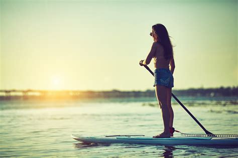 Nude standup paddleboarding experiences